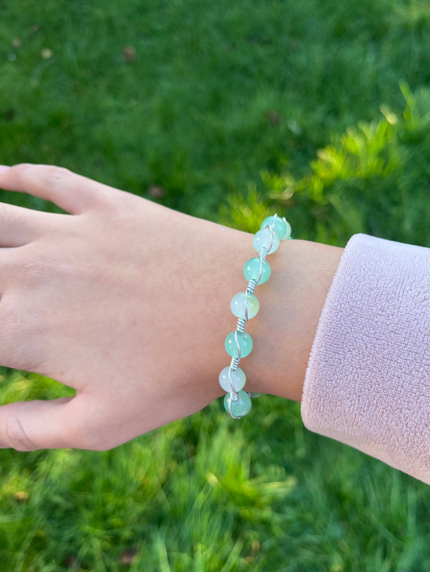 Light blue and teal wire wrapped bracelet