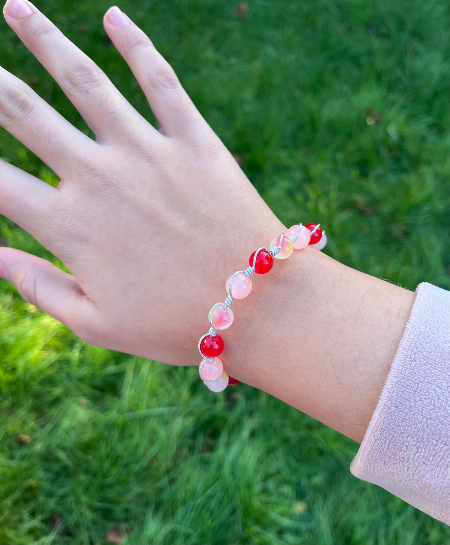 Red and peach wire wrapped bracelet