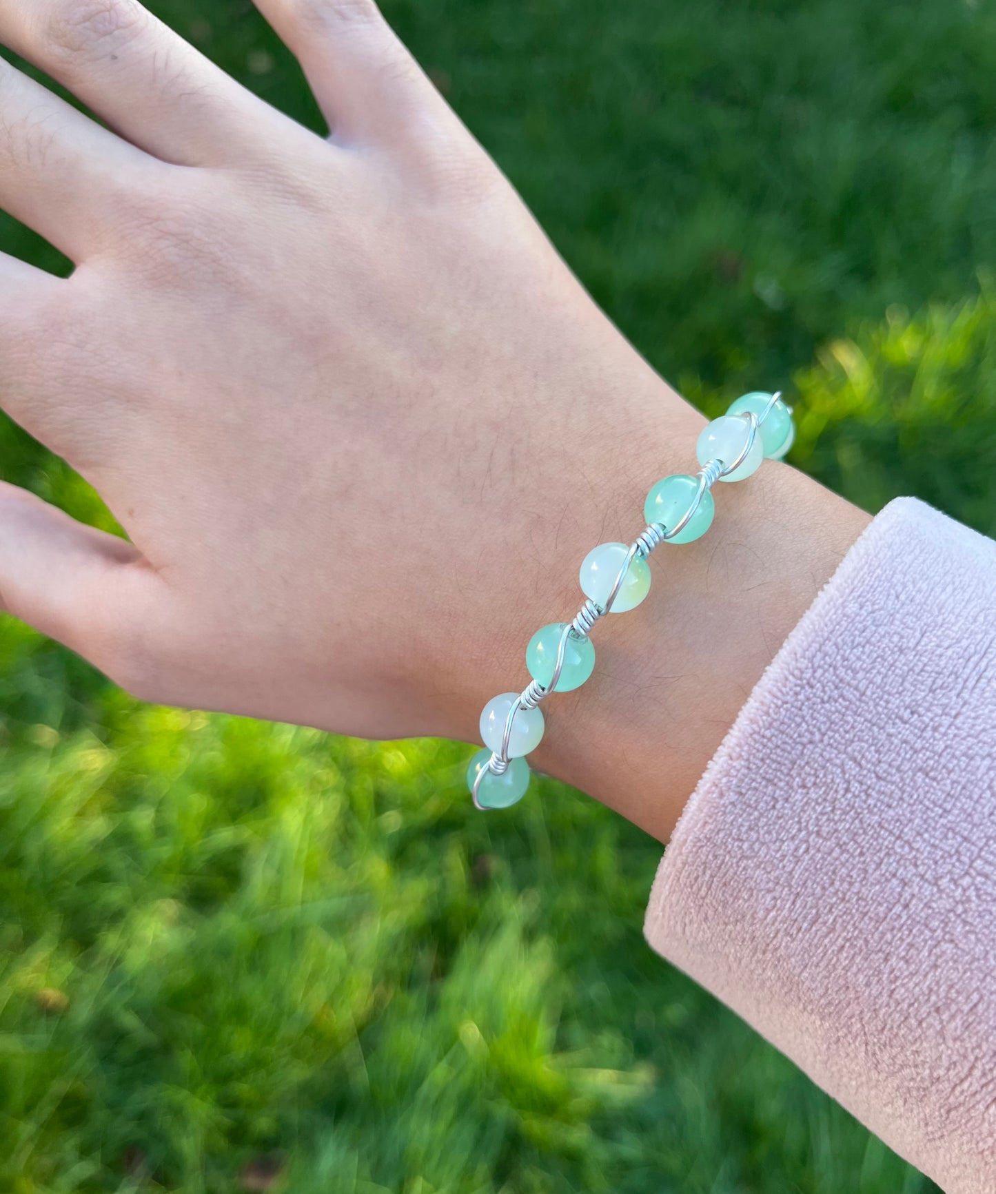 Light blue and teal wire wrapped bracelet