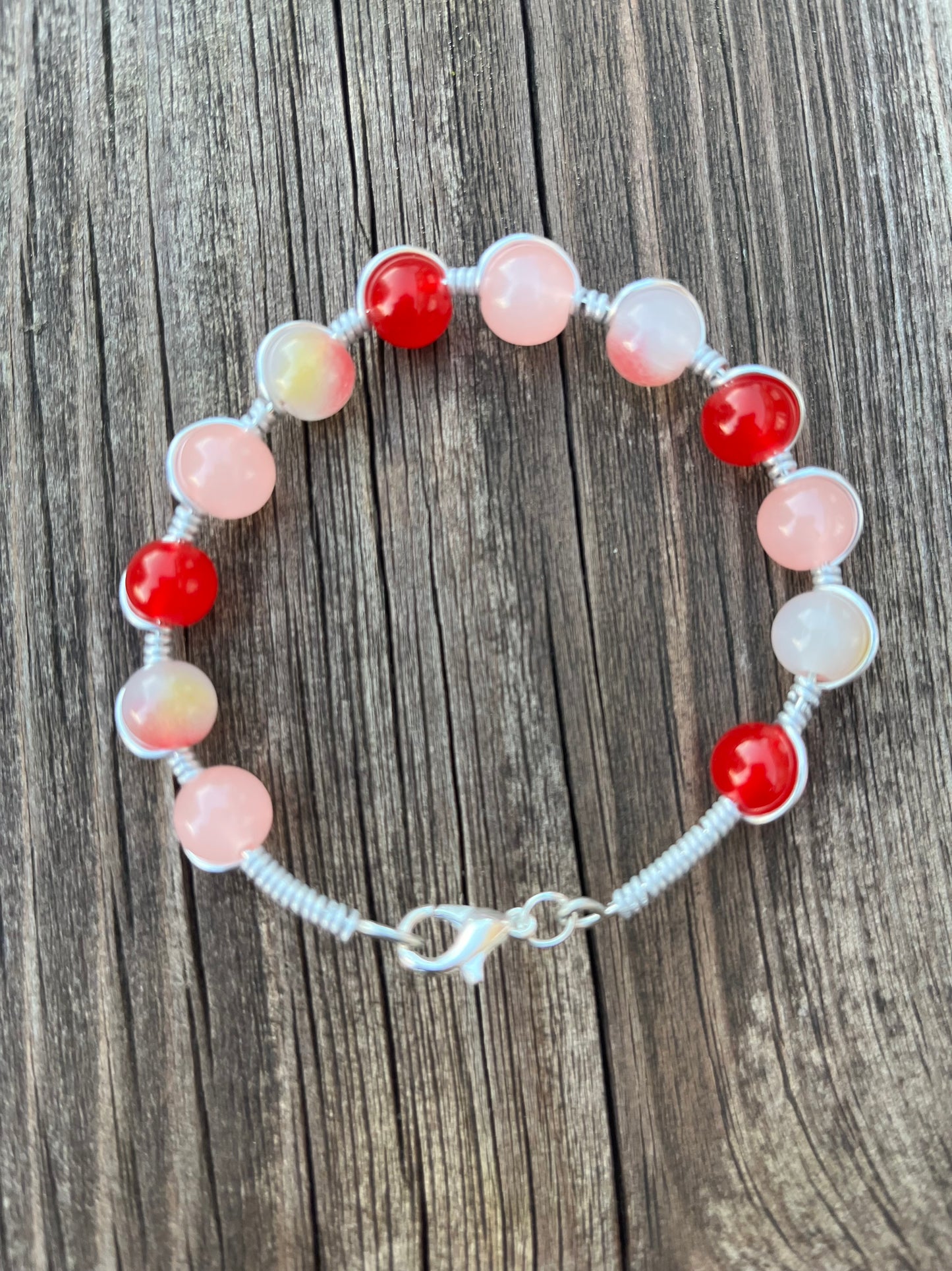 Red and peach wire wrapped bracelet