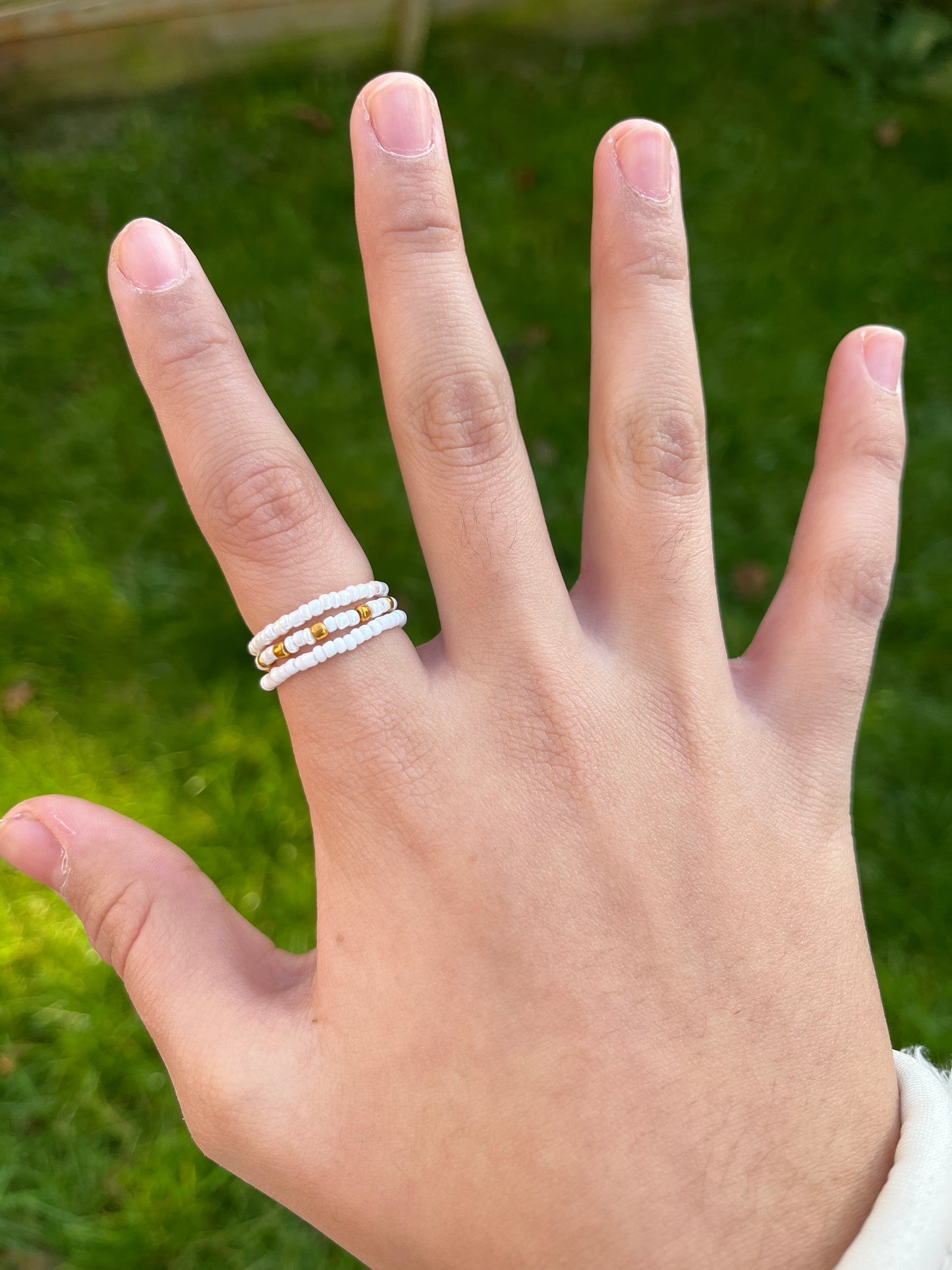 White and gold beaded ring set