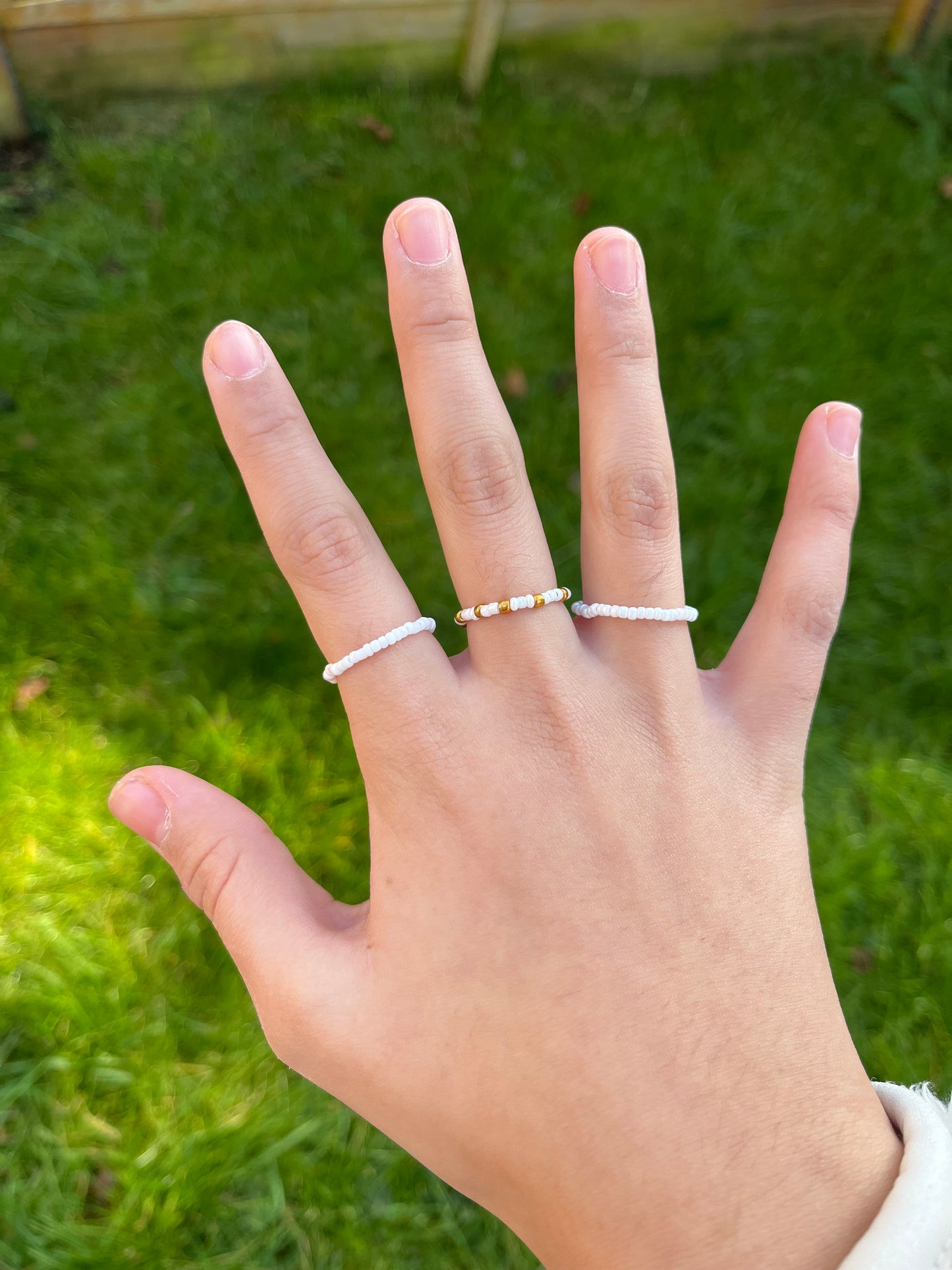 White and gold beaded ring set